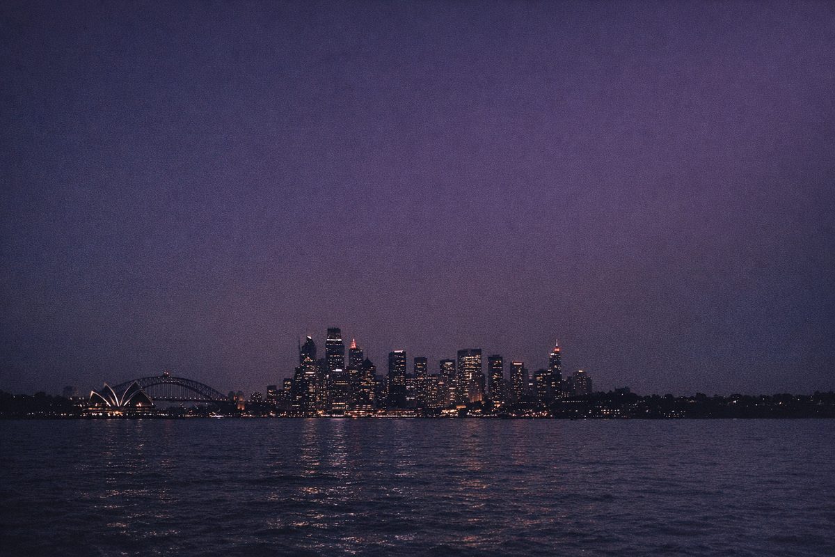 Sydney city skyline at night, seen from across the water